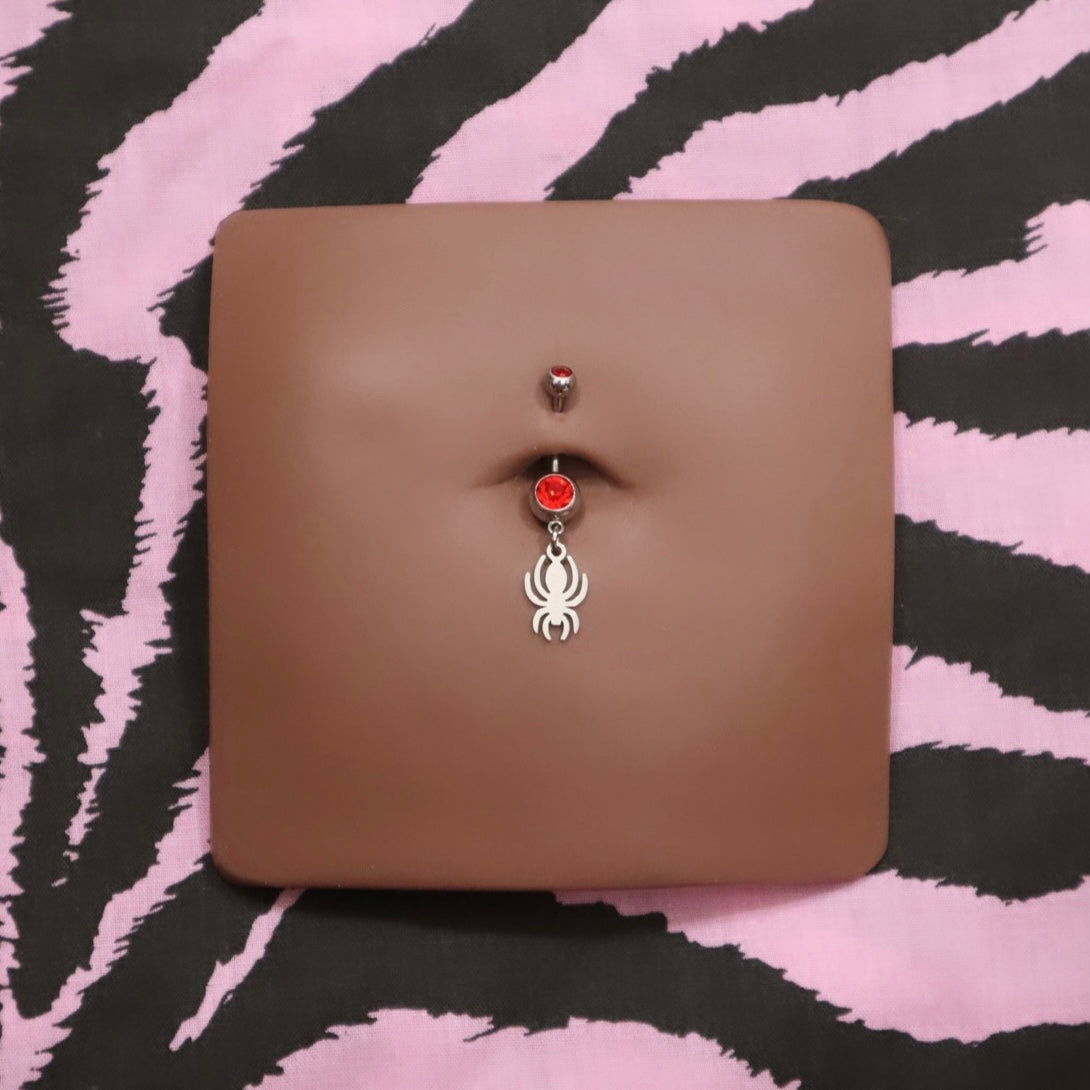 Red Hot Spider Belly Piercing